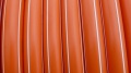 HDPE trubka 40/33 - oranžová 4x1 bílý pruh